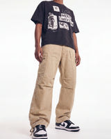 Vale Forever Creamsicle Cargo Pants cream, waist-down front view on model showing the cargo pockets and rhinestone scatter
