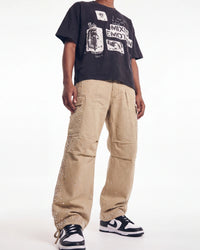 Vale Forever Creamsicle Cargo Pants cream, waist-down front view on model showing the cargo pockets and rhinestone scatter