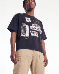Mixed Emotions Stamped Tee black, upper body front view on model showing the punk zine-collage graphic