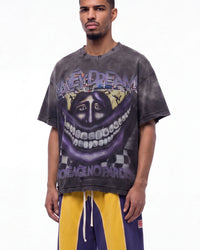 Vale Forever Smiley Face Tee black, upper body front view on model showing the purple grinning-face graphic