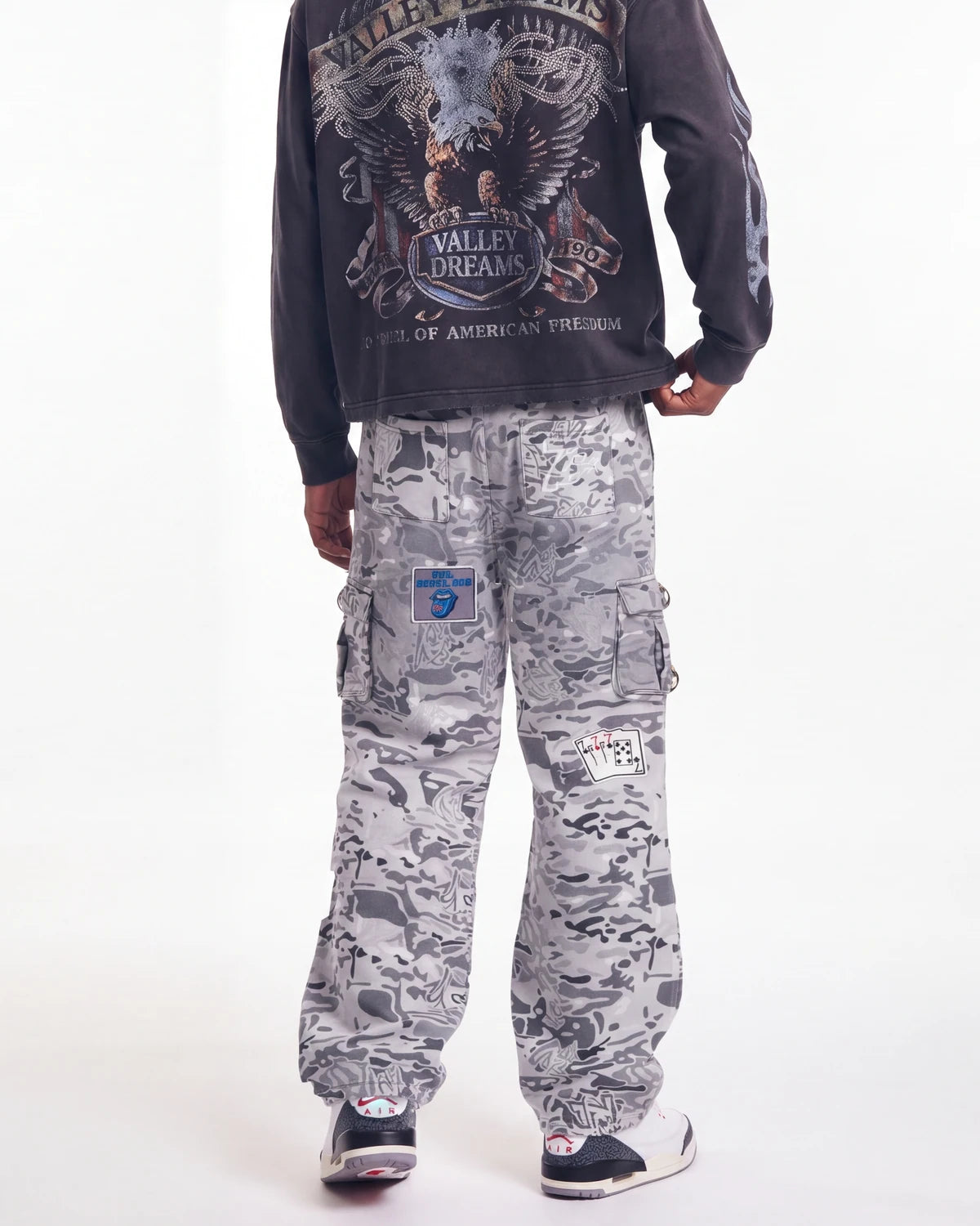 Triple Sevens Camo Sweatpants grey, waist-down rear view on model showing the camo print