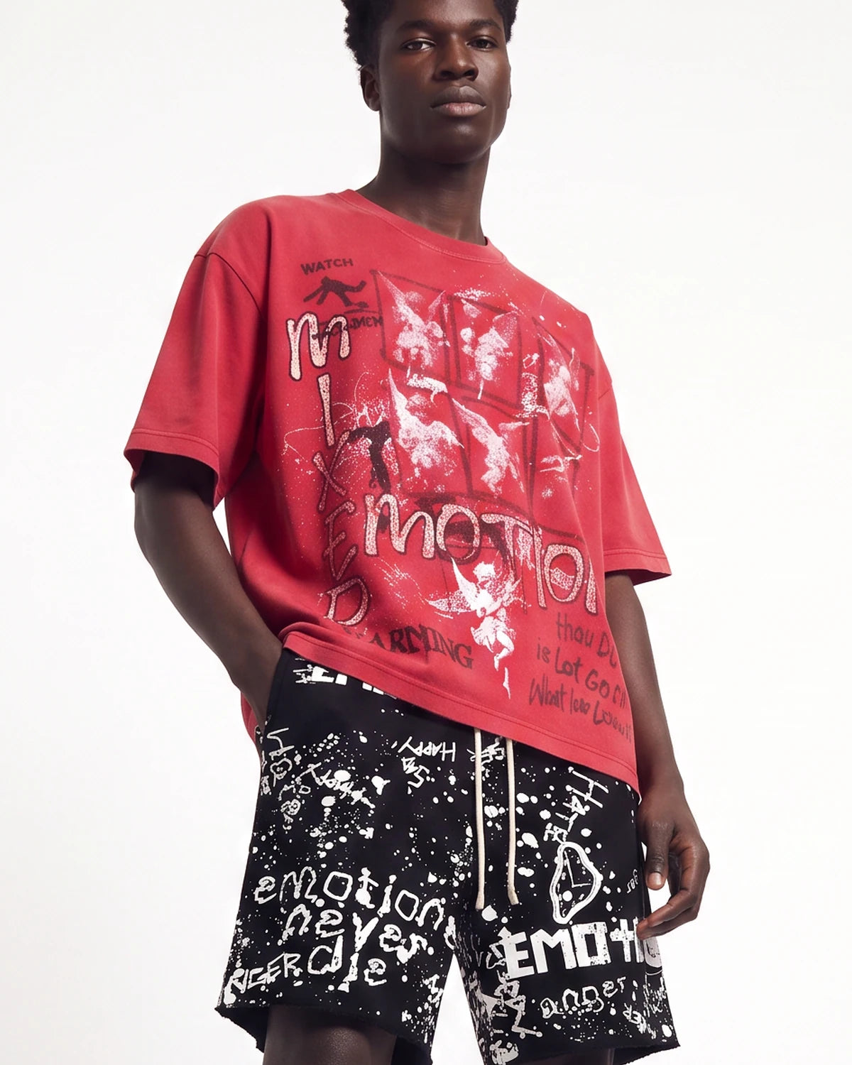 Mixed Emotions Crimson Tee red, upper body front view on model showing the chalk cherub collage