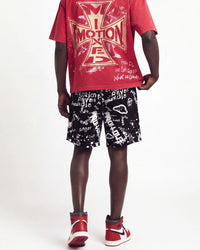 Mixed Emotions Graffiti Shorts black, waist-down rear view on model showing the graffiti scrawls