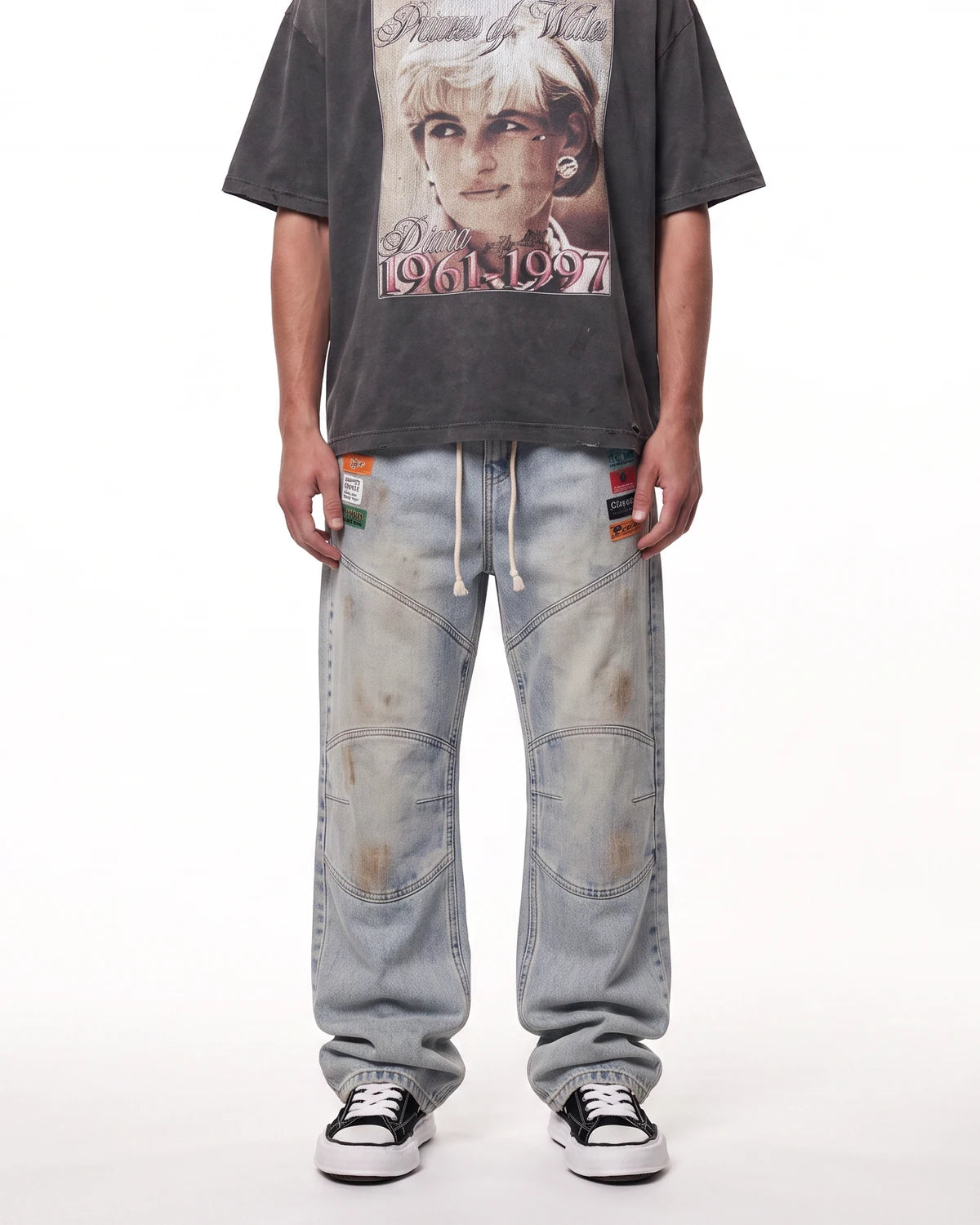 Triple Sevens Moto Denim Pants blue, waist-down front view on model showing the light-wash denim and patches