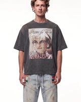 Triple Sevens Diana Tee black, upper body front view on model showing the memorial portrait graphic