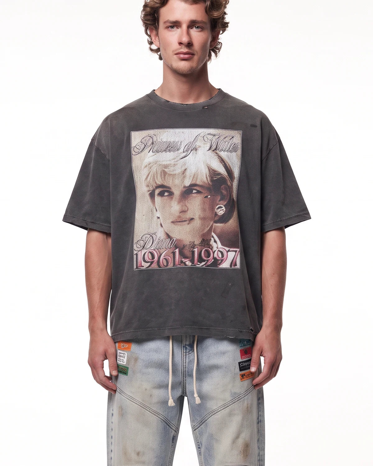 Triple Sevens Diana Tee black, upper body front view on model showing the memorial portrait graphic