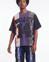 Vale Forever Chopped Tee black, upper body front view on model showing the purple and camo patchwork panels
