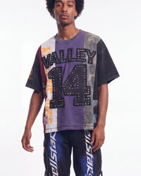 Vale Forever Chopped Tee black, upper body front view on model showing the purple and camo patchwork panels