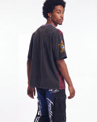 Vale Forever Chopped Tee black, upper body rear view on model showing the plain back and gold sleeve patch