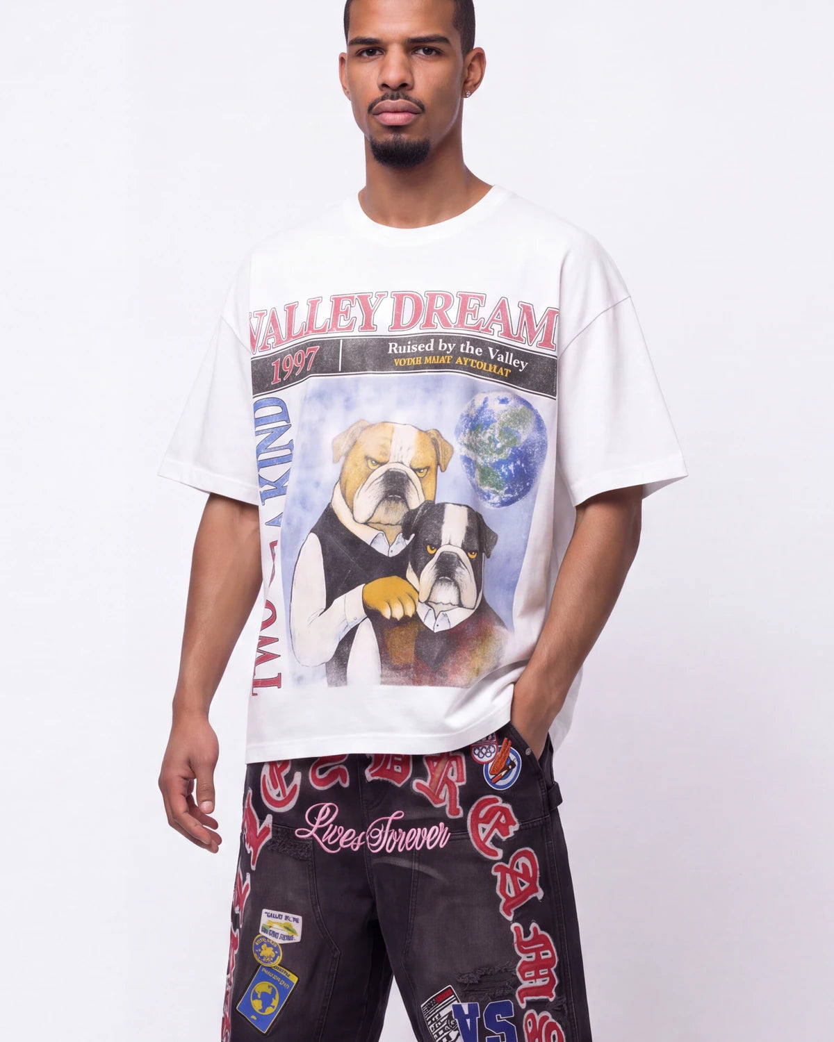 Vale Forever Step Bro Tee white, upper body front view on model showing the Valley Dreams 1997 bulldog graphic
