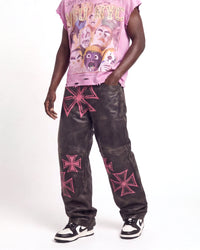 Vale Forever Croxxx Leather Pants bubblegum black and pink, waist-down front view on model showing the pink cross appliqués
