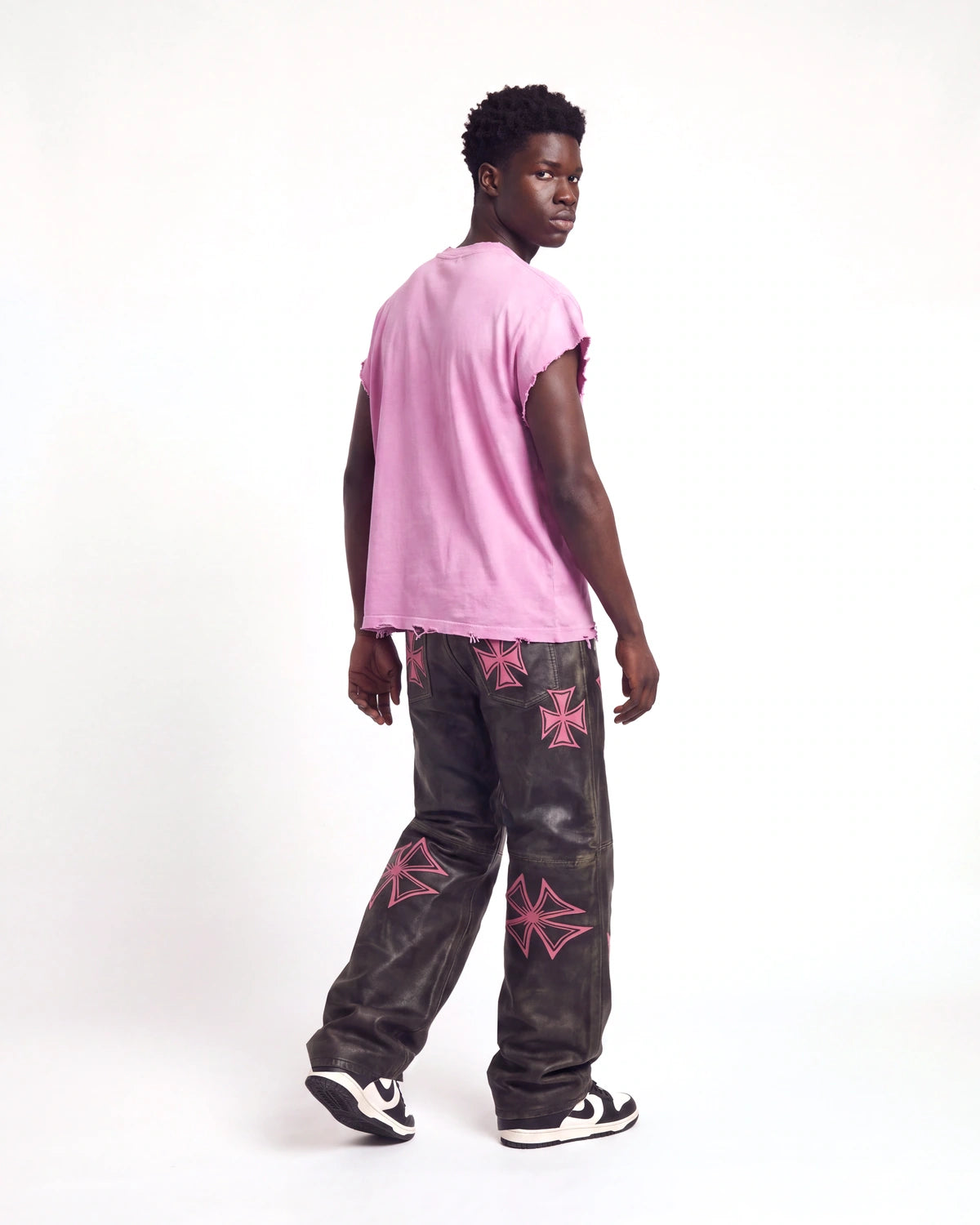 Vale Forever Croxxx Leather Pants bubblegum black and pink, full rear view on model with pink Valley Dreams script on the waistband