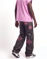 Vale Forever Croxxx Leather Pants bubblegum black and pink, waist-down rear view on model showing the cross appliqués