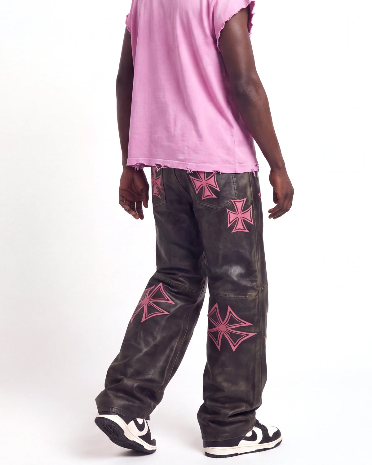 Vale Forever Croxxx Leather Pants bubblegum black and pink, waist-down rear view on model showing the cross appliqués