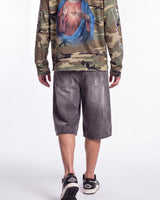 Bravest Studios Sapphire Jorts black, waist-down rear view on model showing the washed black denim