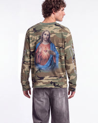 Bravest Studios Shepherd LS Tee camo green, upper body rear view on model showing the Sacred Heart print