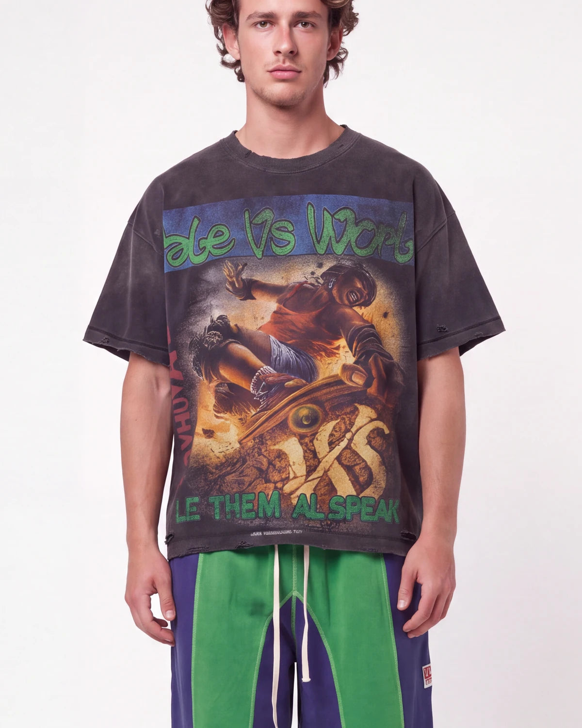 Vale Forever Metal Speaker Tee black, upper body front view on model showing the Vale Vs World skateboarding graphic