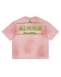 All Human Champagne Room Tee Pink, back view with An ALL HUMAN Presentation in green
