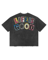 All Human Copy & Paste Tee Black, back view with LIFE IS GOOD in multicoloured cut-out letters