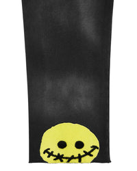 All Human Deli Set V2 Sweatsuit black wash, close-up of the stitched smiley patch on the pant leg