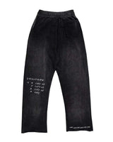 All Human El Cielo Sweatpants black wash, back view showing the EVERYTHING IS A COPY OF A COPY print and LIVE! LIVE! LIVE! hem