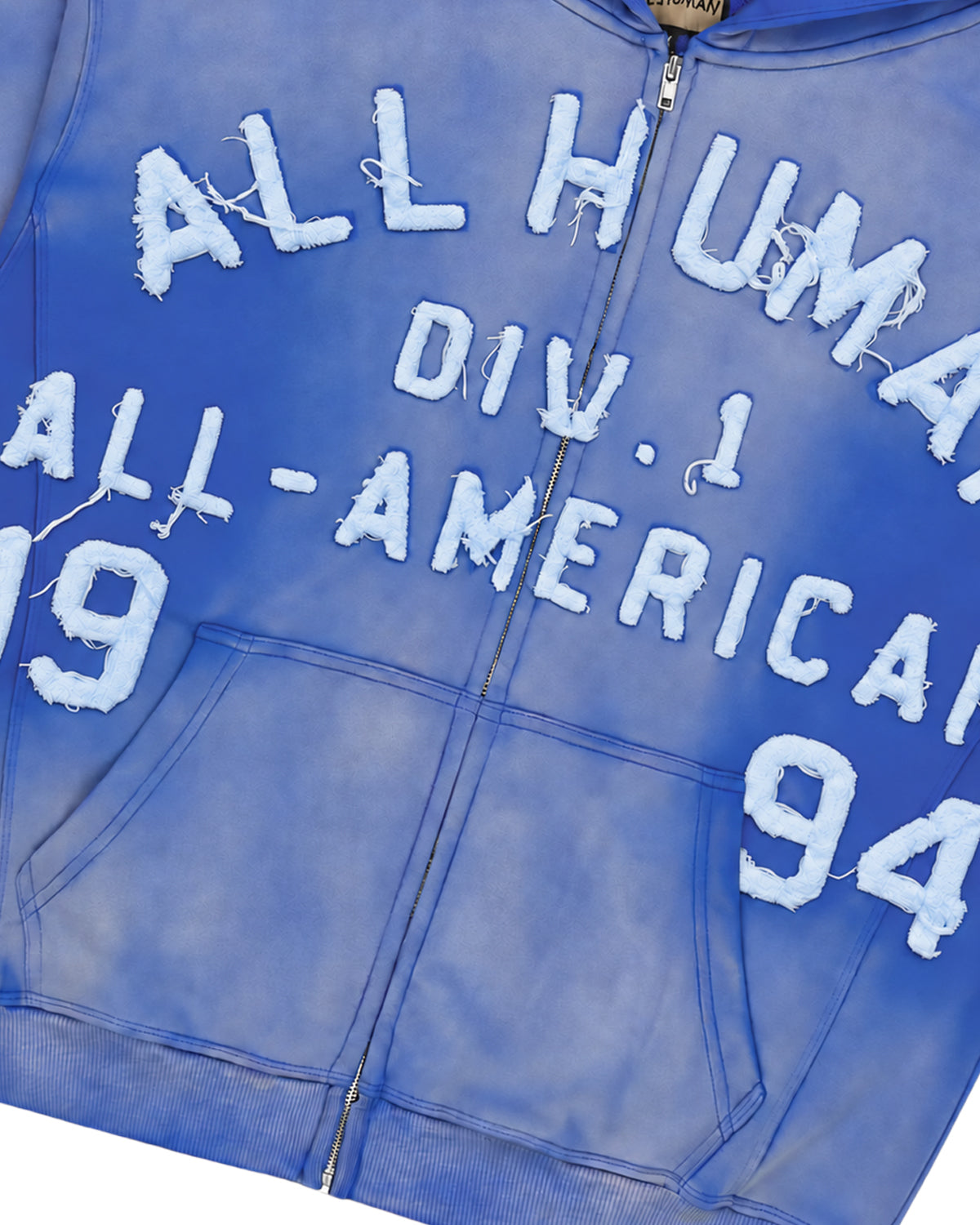 All Human El Perro Set V2 Sweatsuit blue wash, close-up of the chest lettering and zipper