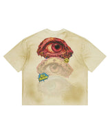 All Human Golden Years Tee cream, back view showing a large bloodshot eye graphic with a yellow smiley and comic-burst All Human badge