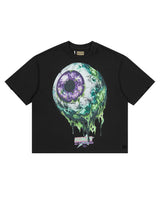 All Human Hereditary Tee Black, black tee with a dripping green and purple eyeball graphic, front view