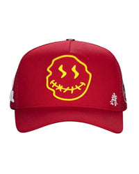 All Human Human After All V2 Trucker Hat Red, red mesh trucker with a large yellow stitched-mouth smiley, front view