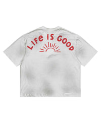 All Human Love Me, Hate Me Tee White, back view with LIFE IS GOOD arched over a red sunrise