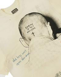 All Human Maybe Tomorrow V3 L/S Tee cream and white, close-up of the shaved-head photo print and handwriting
