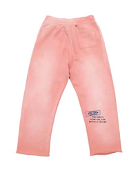 All Human Rehab Sweatpants pink wash, back view showing the Certified Bad Idea Service stamp and TOO MANY HUMANS, NOT ENOUGH SOULS text
