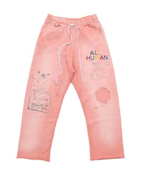 All Human Rehab Sweatpants pink wash, faded pink cotton fleece pants with multicolor ALL HUMAN lettering and crayon drawing prints, front view