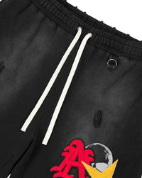 All Human Schizo Shorts black, close-up of the drawcord waist and red imp graphic
