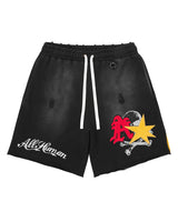 All Human Schizo Shorts black, washed sweat shorts with a red imp, gold star and moon leg graphic, front view