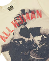 All Human The Fade Tee cream, close-up of the red All Human lettering and football photo print