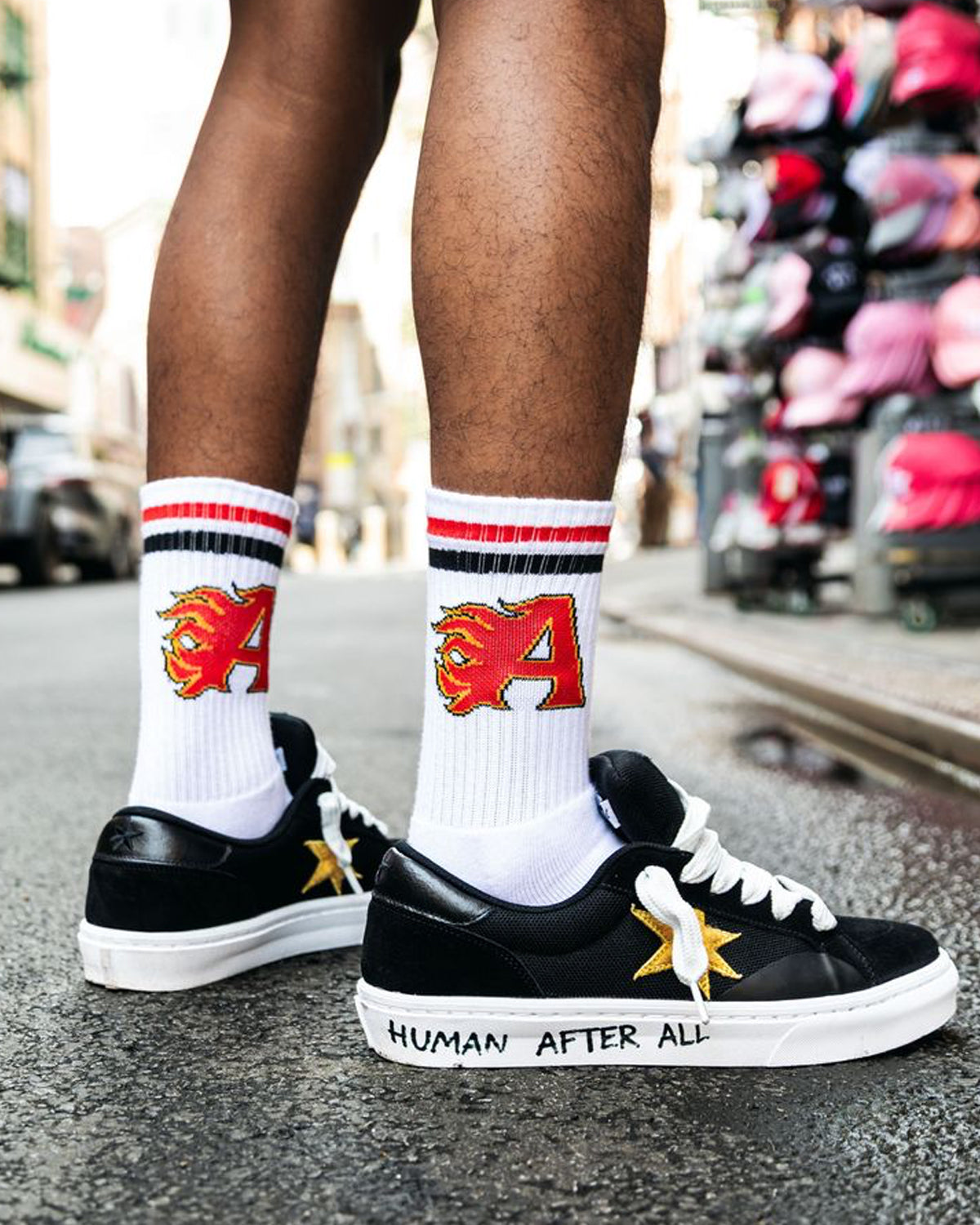 All Human The Sock V2 white, black and red, socks worn on foot with black sneakers