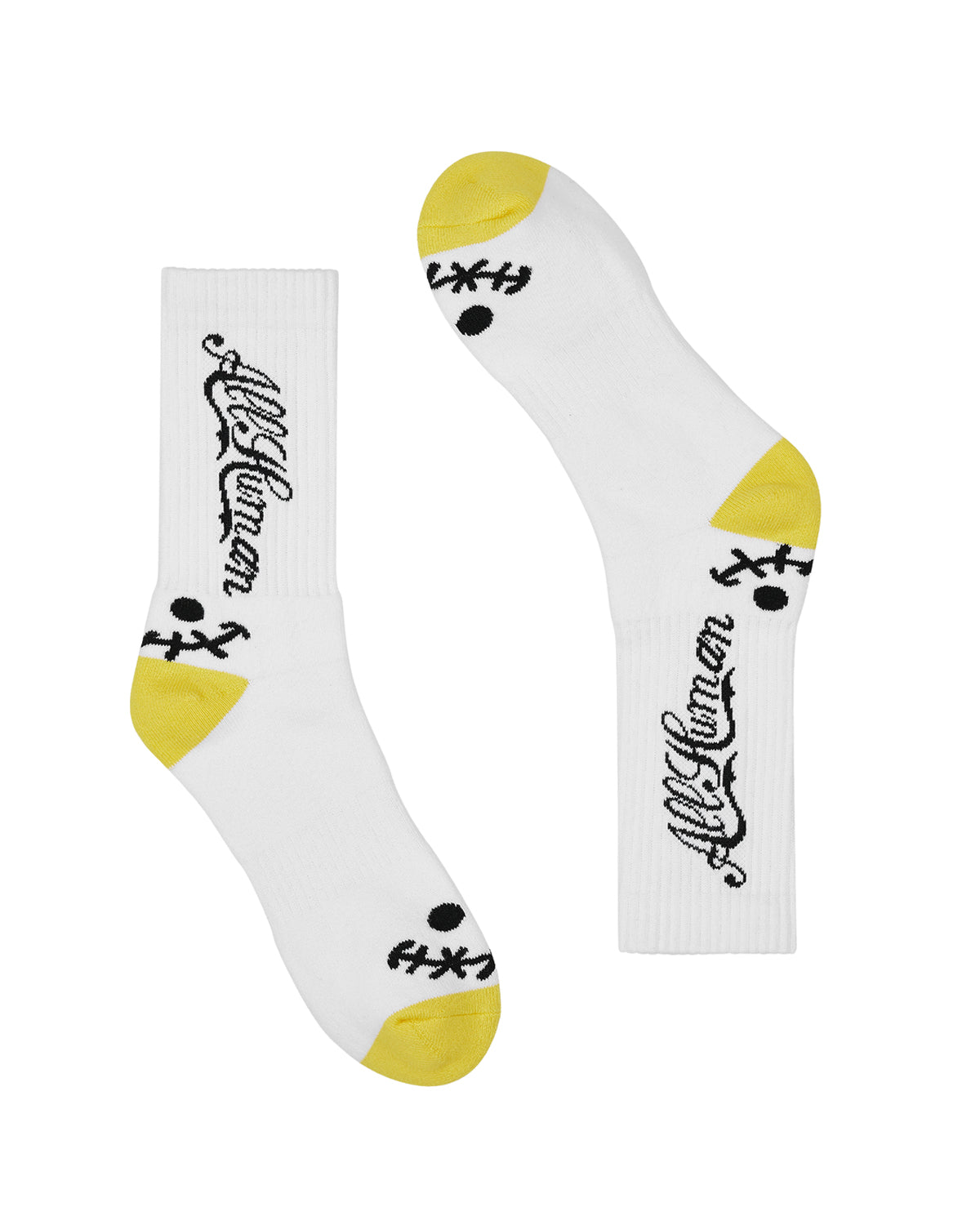 All Human The Sock V3 white, black and yellow, crew socks with black script and yellow heel, flat lay