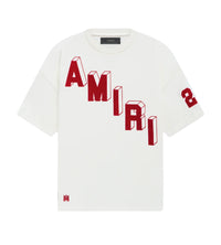 Amiri Flocked Hockey Skater Tee Vanilla front view