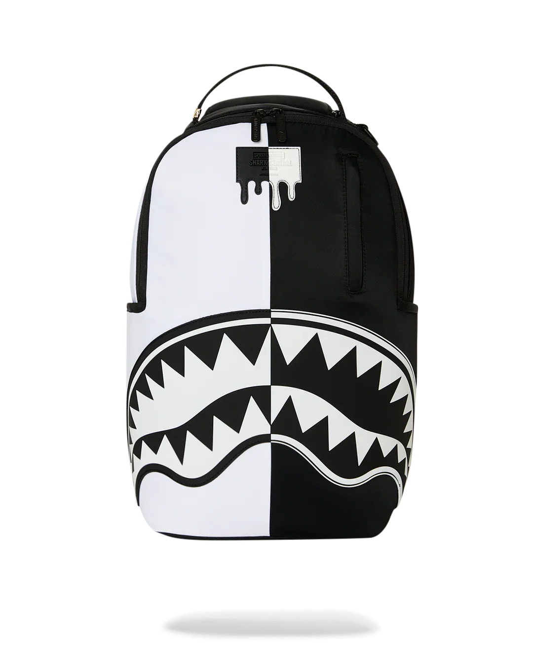 Sprayground Shark Central 2.0 Beyond Time Backpack, split black and white backpack with mirrored shark mouth