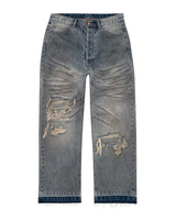 Bravest Studios Dirty Star Denim blue, dirty-wash denim with shredded knees and a let-down indigo hem, front view