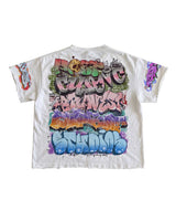 Bravest Studios Graf Tee white, back view showing graffiti skull, spray can and blue Studios bubble lettering