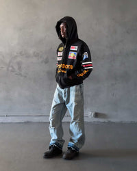 Bravest Studios Ransom Zip Up Hoodie black, worn by a model with the hood up, styled view