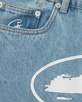 Corteiz Island Denim Short stonewash, close-up of the embroidered Corteiz star at the coin pocket and the island print below