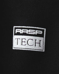 GV Gallery Berry Cutoff Shorts black, close-up of the puff-printed Rasp Tech box logo