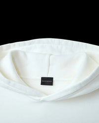 GV Gallery Blonde Hoodie white, close-up of the hood and woven neck label