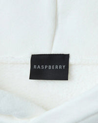 GV Gallery Blonde Hoodie white, close-up of the black woven Raspberry neck label