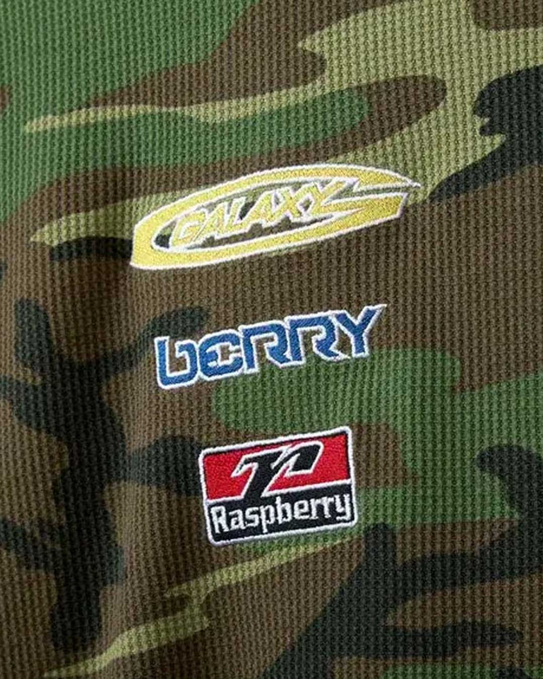 GV Gallery Camo L/S Thermal, close-up of the waffle knit and embroidered Raspberry patches