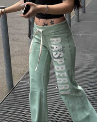 GV Gallery Seafoam Women's Sweatpants teal on a model, full-length outdoor view