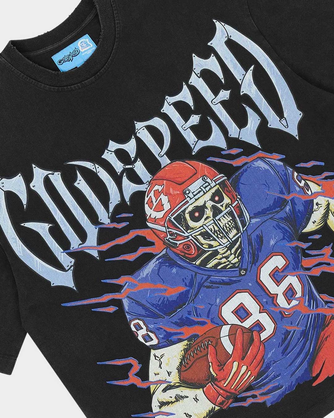 Godspeed Endzone Tee black, angled close-up of the skeleton football player graphic and chrome Godspeed lettering